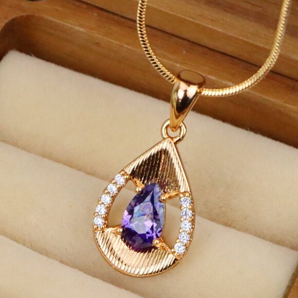 "Teardrop Purple Pendant with Dazzling Accents in Gold Finish, XPPT1690 - Picture 1 of 13